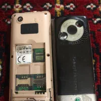 دو گوشی دکمه ای خراب