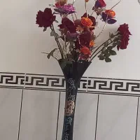 گل بهمراه گلدان