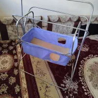 گهواره وکمک مادر