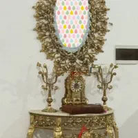 آینه و شمعدان با ساعت