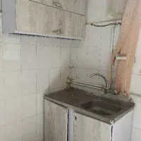 آب چکان و کابینت و سینک ظرفشویی با هم