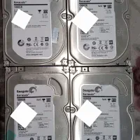 چهار عدد هارد کامپیوتر و دوربین مدار بسته