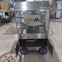 چرخ دستی فر خیابانی برای پخت فلافل ساندویچی سمبوسه