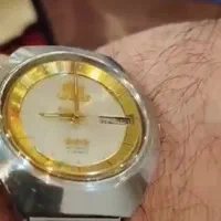 ساعت اورینت دور زه میکرون طلا