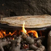 تولیدی و پخت نان محلی طاها