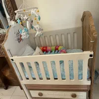 تخت گهواره ای نوزاد به همراه خوشخواب