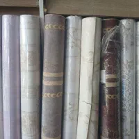 نصب کاغذ دیواری با چسب زیر کار رولی ۲۰۰ هزار