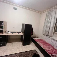 تخت و کمد و میز تحریر و کتابخانه