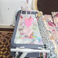 تخت کودک.تخت و گهواره کنار مادر