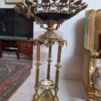 میوه خوری کنار سالنی تمام برنجی