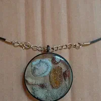 گوشواره و گردنبند اکسسوری با طرح دلخاه
