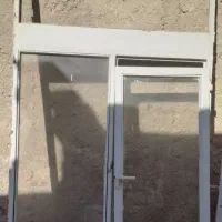 پنجره و درب اهنی با درب بازشو و شیشه