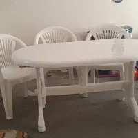 میز 6 نفره با سه تا صندلی پلاستیکی