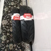 اگزوز قهرمانی و لاستیک و لوازم موتور تریل و کمک ns