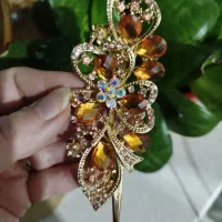 گلسر طلایی و تل سر مجلسی نگین آبی مو مصنوعی تزیینی