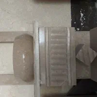 روشویی سنگی همراه با قاب آینه