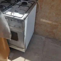 گاز آشپز خانه  قدیمی تمیز تمیز  ۴ شعله با فر