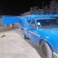 حمل بار با نیسان با کار گر