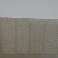 نقاش نقاشی ساختمان رنگارنگ