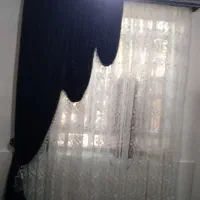 پرده و ساعت ایستاده