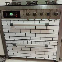 اجاق گاز طرح فر صفحه شیشه ای