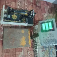 یک عدد چرخ خیاطی مارشال ویک عدد باسکول