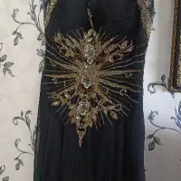 ۲ عدد لباس مجلسی و یک جفت کفش