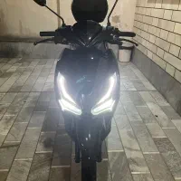 کلیک کویر ۱۴۰۲ با کلاه و باکس و آینه یدک