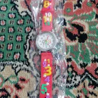 ساعت و‌ جوراب و گلسر بچگانه