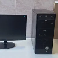 کامپیوتر خانگی شامل کیس، مانیتور و میز