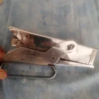 دستگاه منگنه