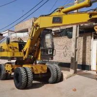 بیل مکانیکی لاستیکی استیجاری