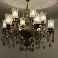 لوستر 8 شاخه برنجی و یک عدد روکوب دیواری