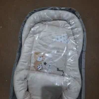 آغوشی نوزاد یه بارم استفاده نشده  ب فروش می‌رسد