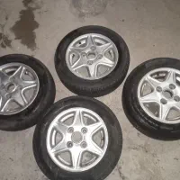 ۴رینگ  با۴لاستیک خارجی ۹۰درصد ماشین پراید.