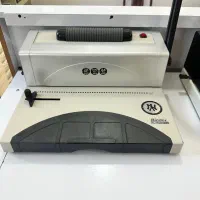 دستگاه پانچ. فنر زن مارپیچ کتاب
