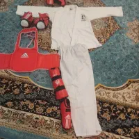 سلام لباس جودو و وسایلش کلاه وپا بند و....