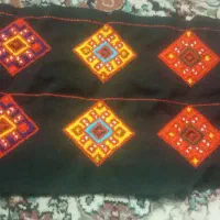 در دامنی میدوزم