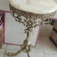 میزبرنزساعت برنز کشکول برنز شیرینی خوری برنزدکوری