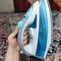 اتو تفال و میز (فقط معاوضه با دمپایی یا صندل )