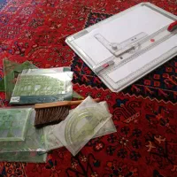 تخته رسم و خط کش و ابزار معماری