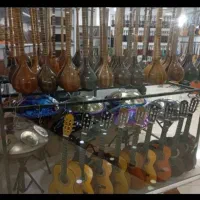 جکو کالیمبا،سنتور اشانتیون گیتار ویولن هنگدرام
