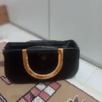 دوتا کیف|کیف، کفش، کمربند|نیشابور, مازول|دیوار