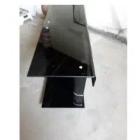 میز تلویزیون شیشه ای در حد واقعا نو وشیک