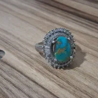 ساعت نقره و سنگ های تراش خورده
