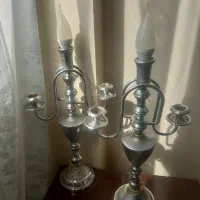 شمعدان نقره یا استیل  و ساعت رومیزی