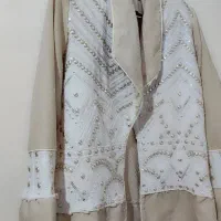 تعدادی مانتو  و کیف و کفش