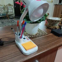 چراغ مطالعه همراه با لامپ کم مصرف