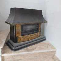 یک عدد بخاری شومینه