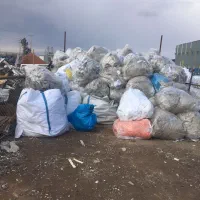 کارگر ضایعاتی تفکیک و اسیاب گونی